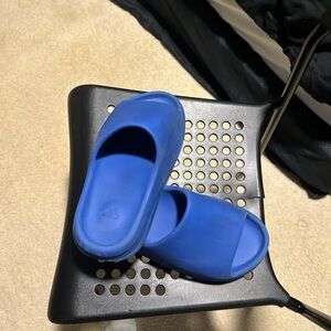 Blue Yeezy slides